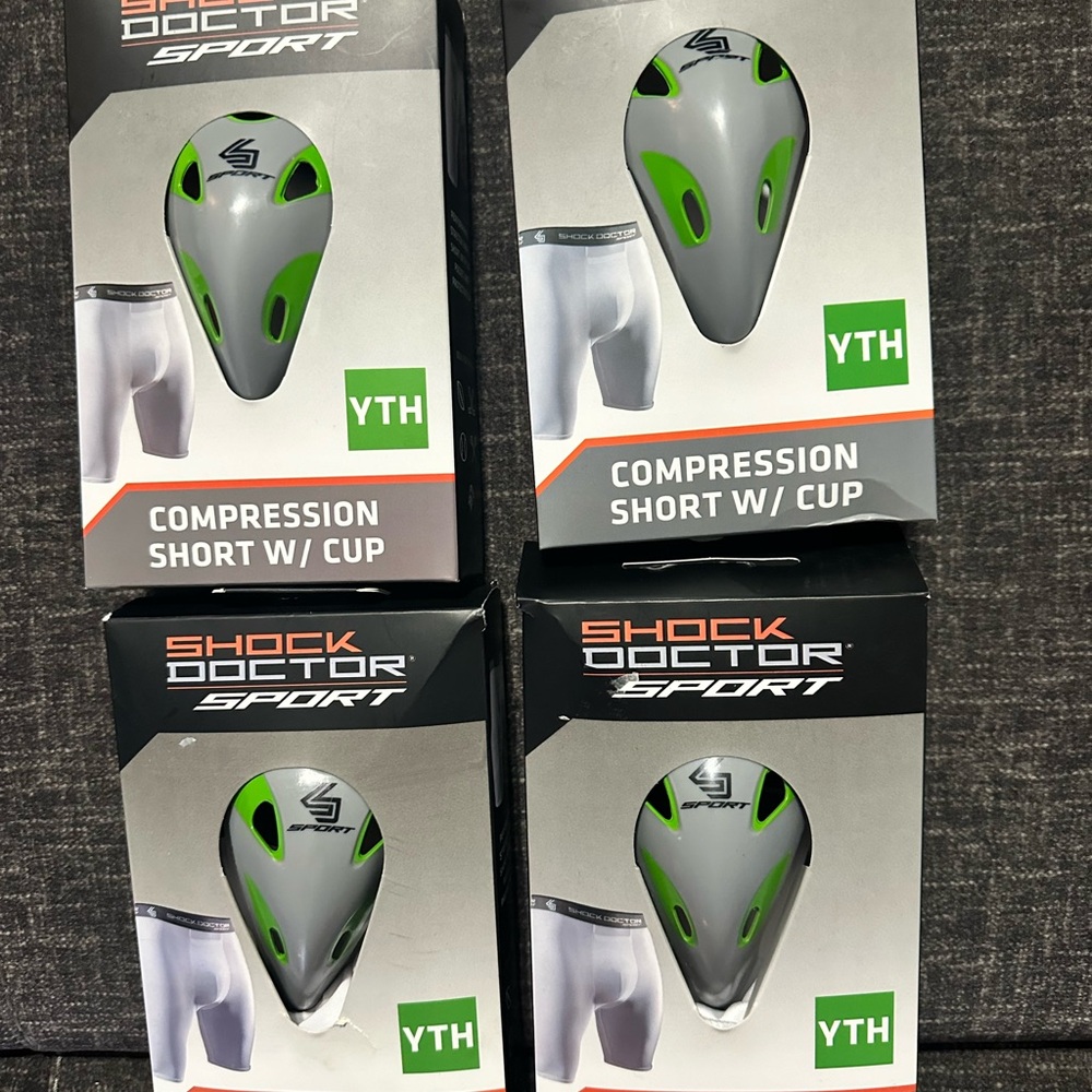 4 Youth Football Compression shorts with cup